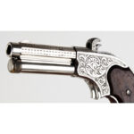 308-655_3_Pistol, Remington, Magazine_engraving-1