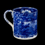 1213-89_1_Dark-Blue-Decorated-Mug,-Man-Woman-Garden-Scene